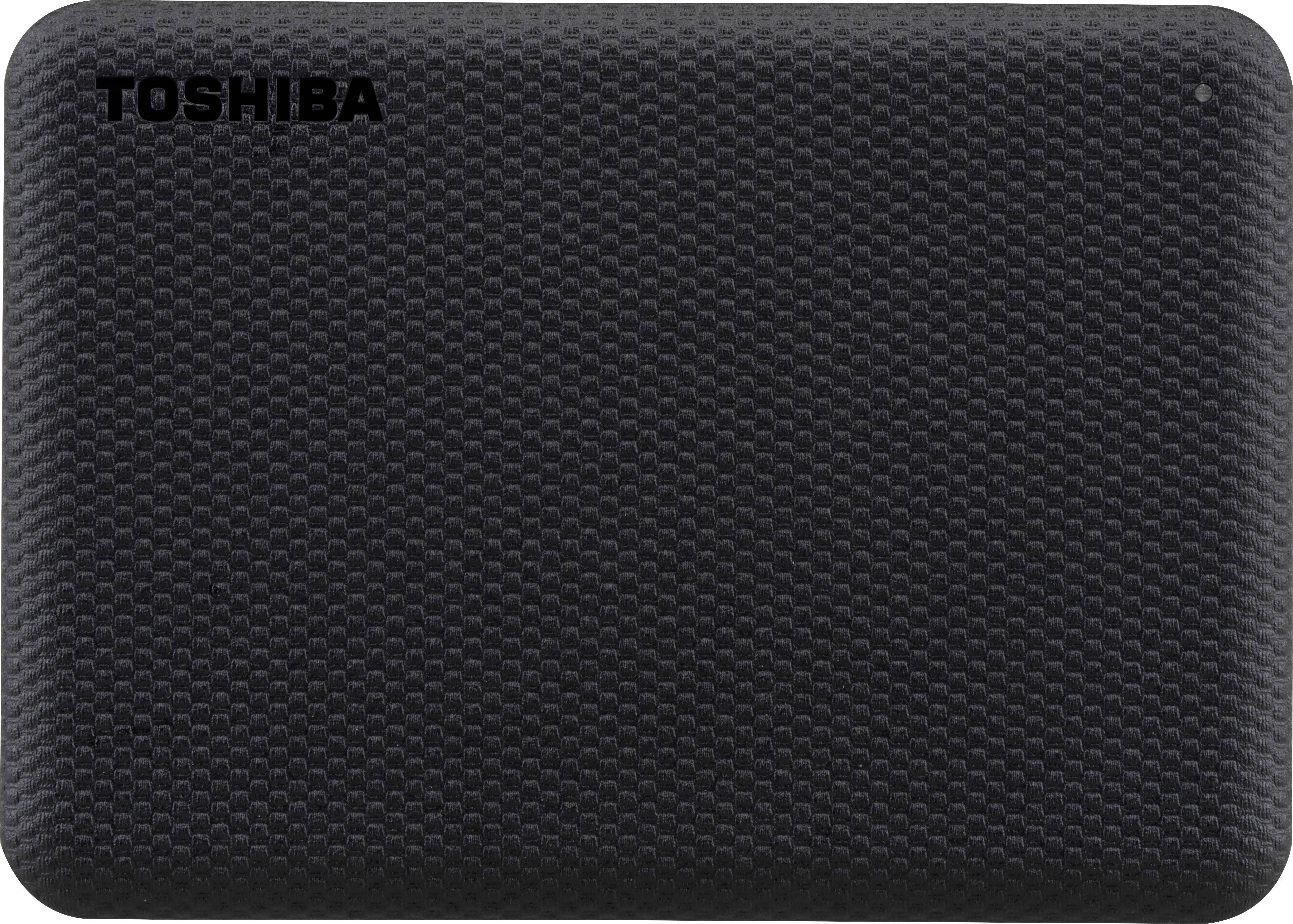 Disque dur externe noir de Toshiba avec texture en surface ; visible du dessus ; sans ports ou câbles apparents.