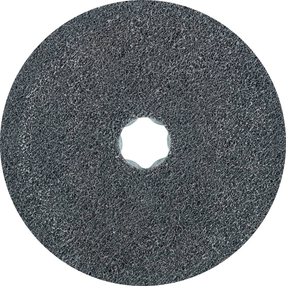 Disque abrasif en matériau grossier, de forme circulaire avec un trou au centre, utilisé pour poncer ou polir des surfaces.