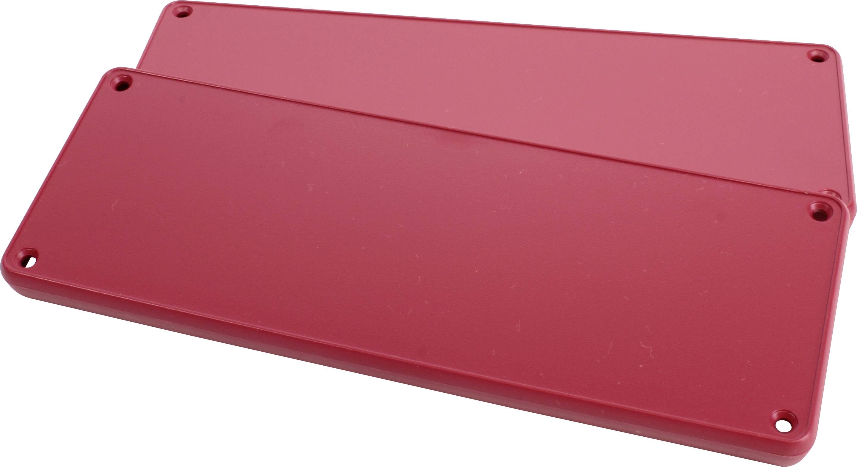 Deux plaques rectangulaires en plastique rouge avec des coins arrondis, disposées côte à côte, probablement des couvercles ou des supports.