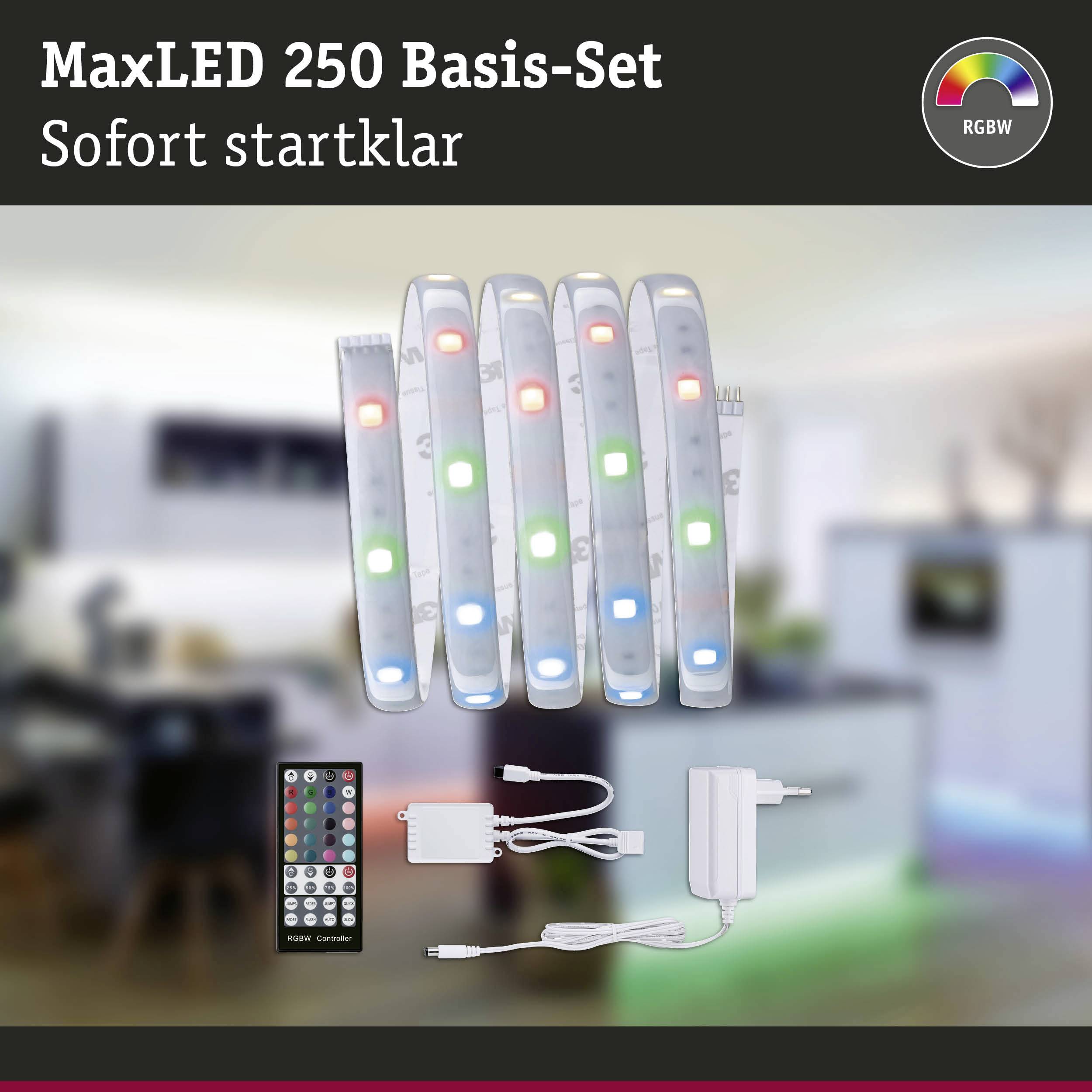 Ensemble de base MaxLED 250 avec télécommande et alimentation, fonction de changement de couleur RVBA, illustré dans un espace de vie moderne.