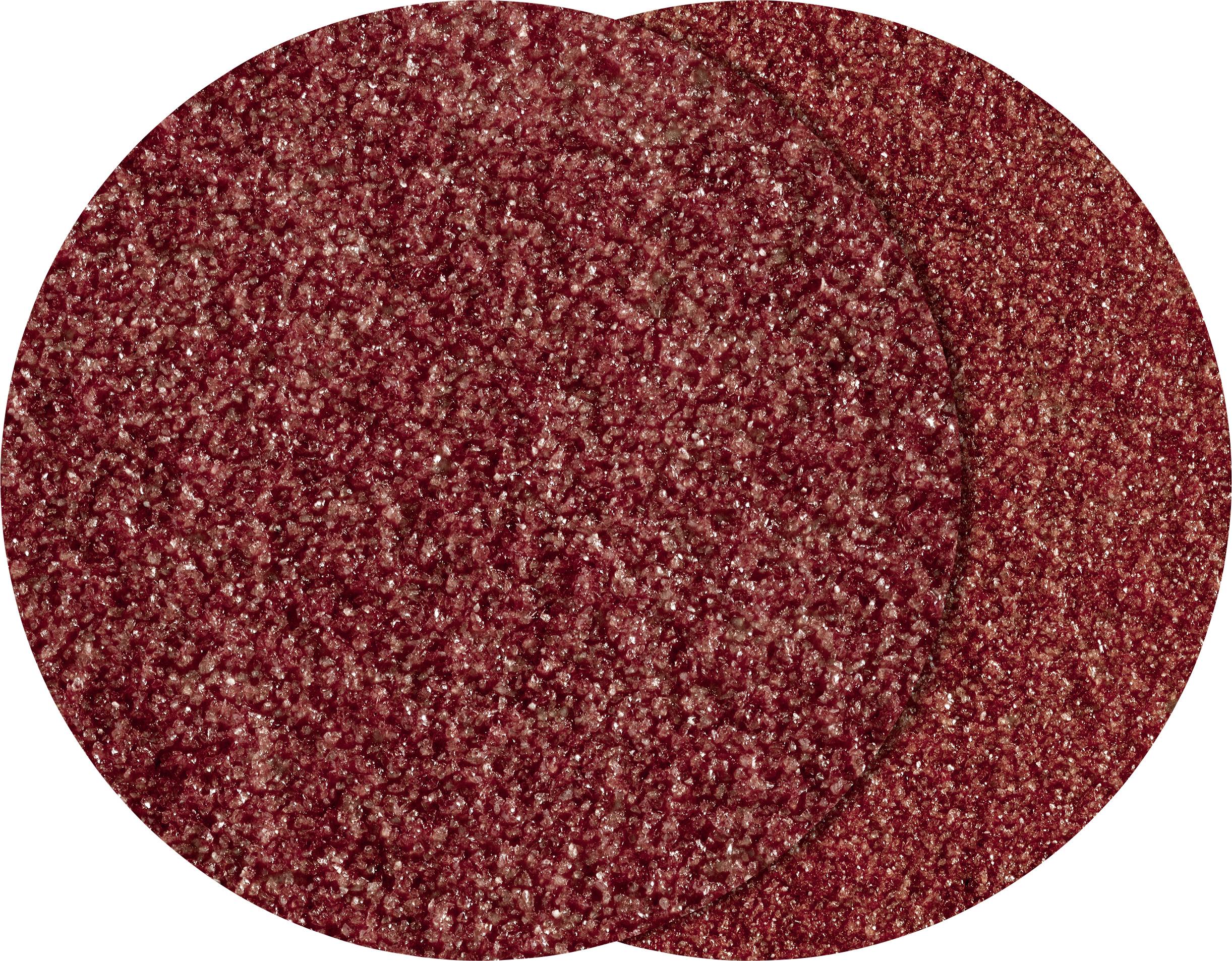Deux disques de papier de verre rouge se chevauchant, à grain grossier, utilisés comme abrasif pour le traitement de surface.