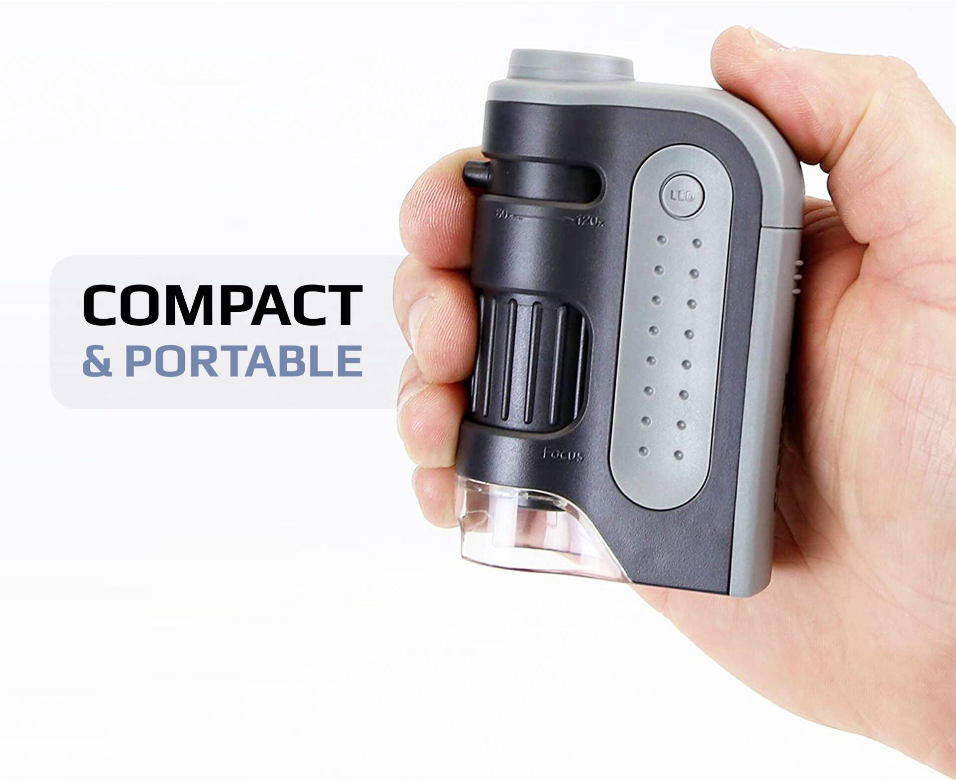 Une main tient un appareil compact et portable. Sur l'image est écrit 'COMPACT & PORTABLE'. L'appareil présente une surface grise et noire.