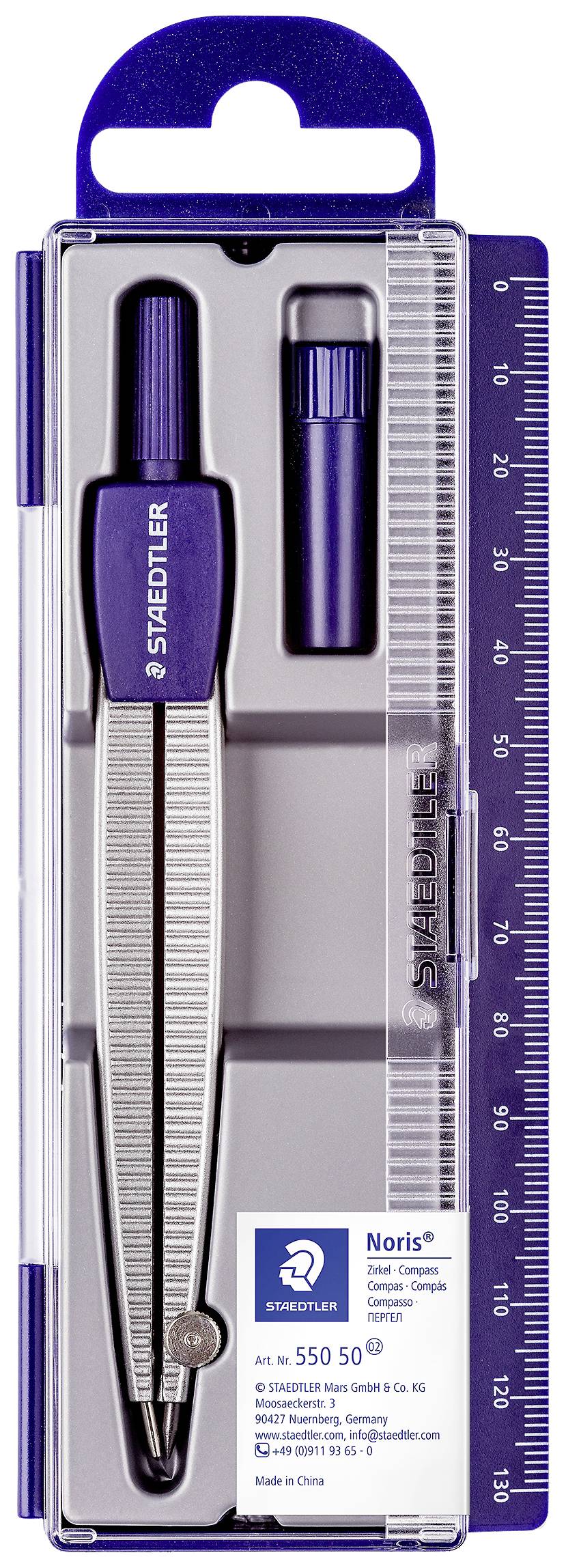 Coffret géométrique Staedtler avec compas, boîte et pièce de rechange, conditionné dans un boîtier transparent avec règle intégrée.