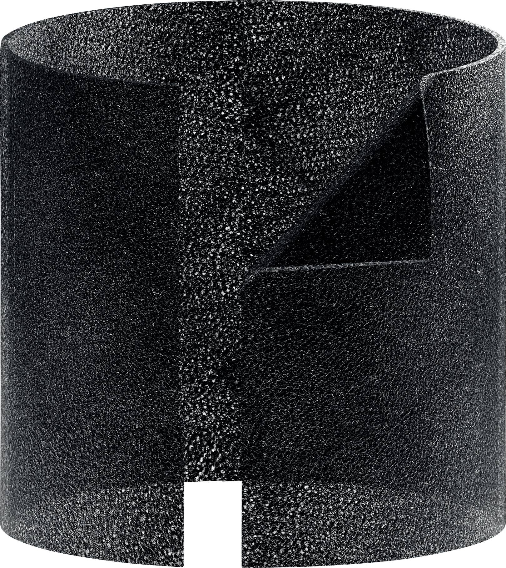 Un objet cylindrique noir en matériau structuré, présentant un bord biseauté et une ouverture sur le côté.