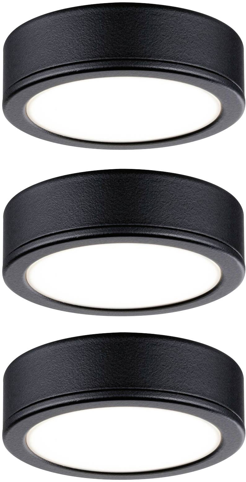 Trois luminaires LED ronds et noirs, disposés verticalement, émettent une lumière blanche douce et uniforme.