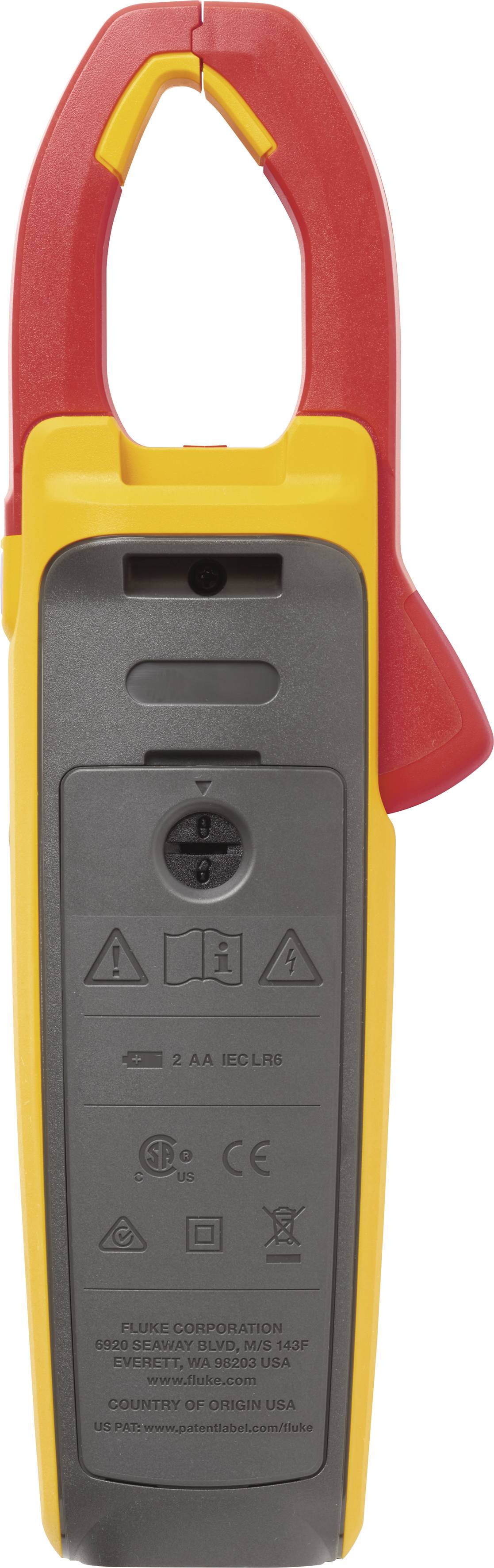 Un appareil de mesure électrique dans un boîtier jaune et rouge, équipé de commandes et comportant des avertissements de sécurité au dos.