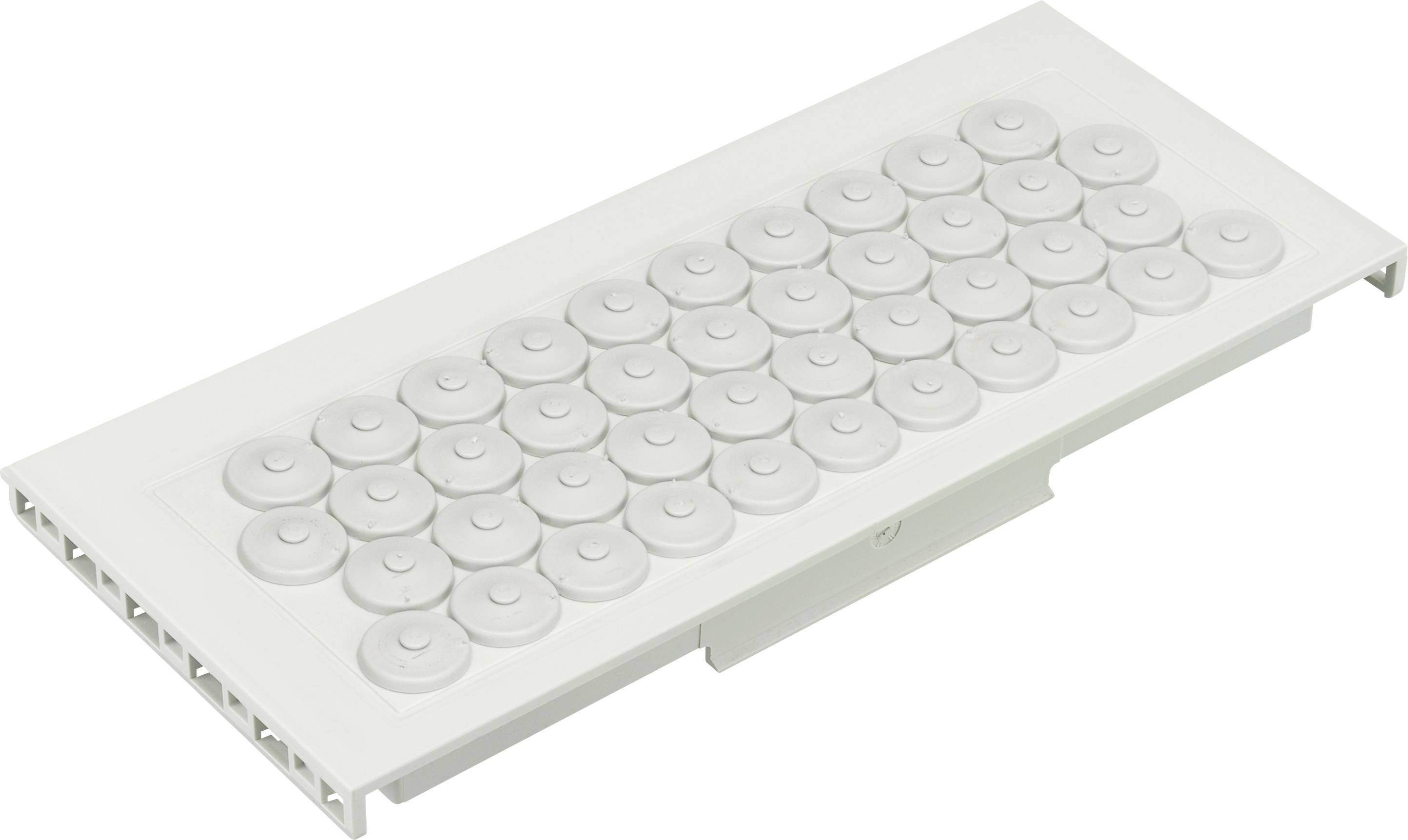 Une grille rectangulaire blanche en plastique avec plusieurs protubérances circulaires, probablement une partie d'un système de ventilation ou de circulation de fluide.