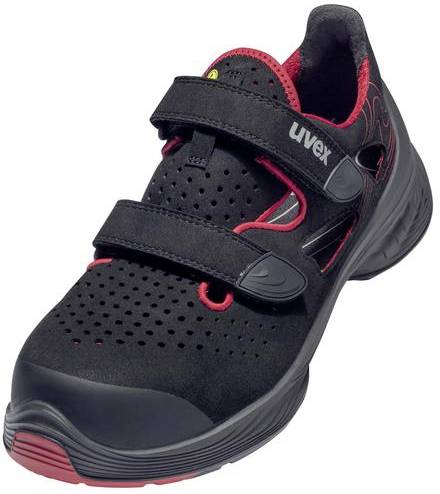 Chaussure de sécurité noire avec doublure intérieure rouge et fermetures à scratch, design perforé pour la ventilation, semelle robuste.