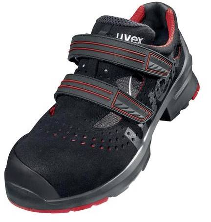 Chaussure de sécurité noire avec des accents rouges et des fermetures velcro, adaptée aux environnements industriels.
