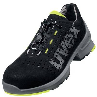 Chaussure de sécurité noire avec des détails gris et jaunes, design sportif, nom de marque 'uvex' visible sur le côté.
