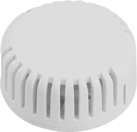 Un détecteur de fumée blanc et rond, avec des orifices de ventilation sur le côté, suggérant qu'il s'agit probablement d'un dispositif de sécurité.