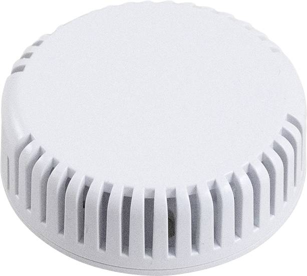 Un détecteur de fumée rond, blanc, avec des fentes de ventilation sur le côté.