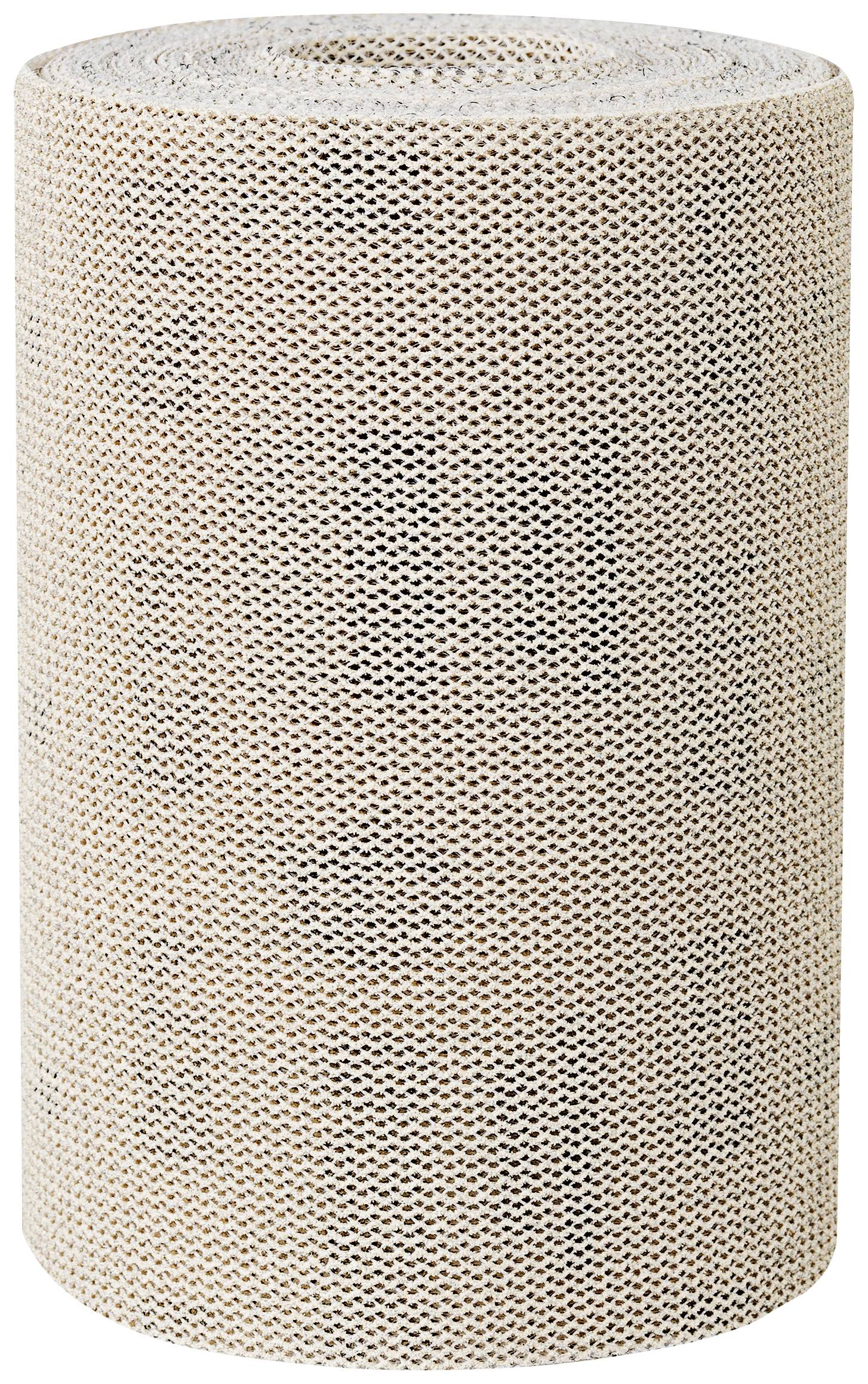 Un grand rouleau de matériau brun perforé, enroulé et dressé verticalement.