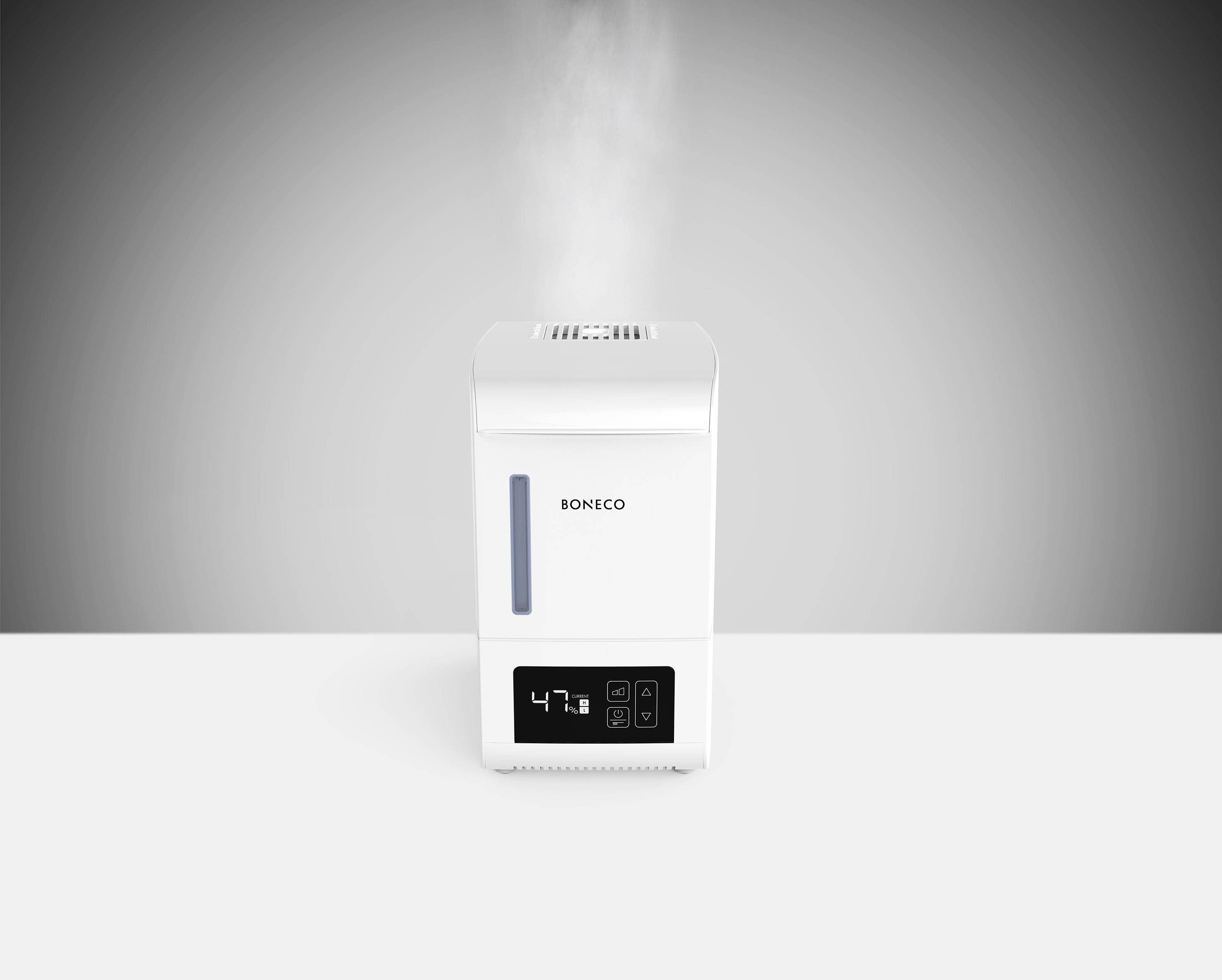 Humidificateur d'air, blanc, avec affichage à 47% d'humidité, de la vapeur s'élève vers le haut.