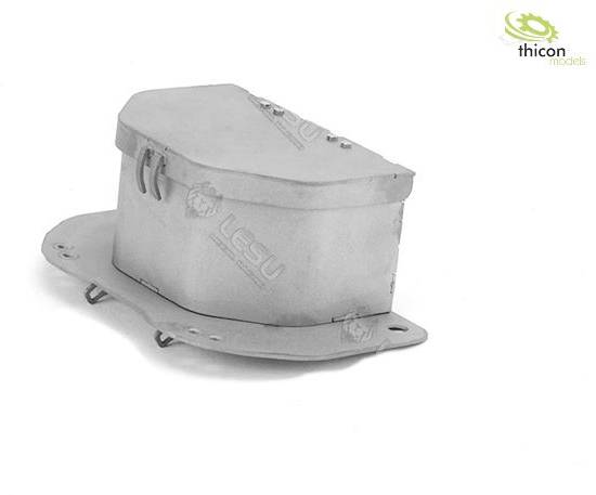 Une pièce métallique de forme rectangulaire avec des arêtes arrondies, probablement un composant d'un modèle de machine.