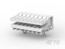 Un gros plan d'un connecteur blanc à broches multiples, typiquement utilisé dans les circuits électroniques pour relier différents composants.