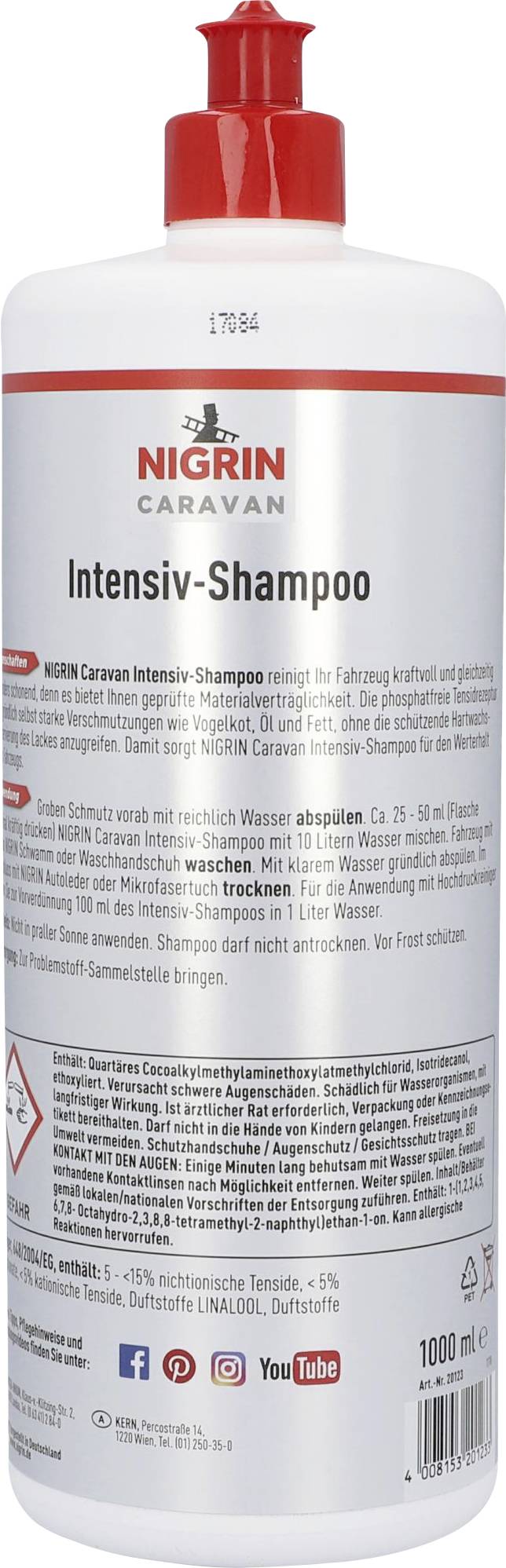 Bouteille de Shampoing Intensif Caravan Nigrin, 1000 ml. Bouchon de fermeture rouge, description d'utilisation et ingrédients au dos.