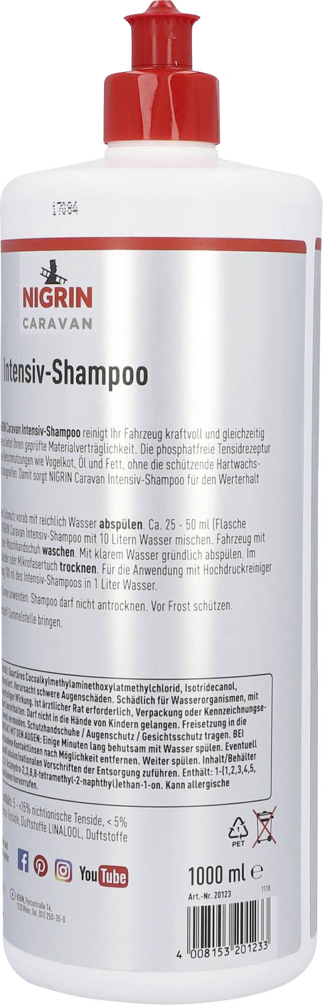 Bouteille de Shampoing Intensif Caravan Nigrin, 1000 ml. Nettoie les véhicules en profondeur. Bouchon rouge, étiquette blanche avec instructions d'utilisation.
