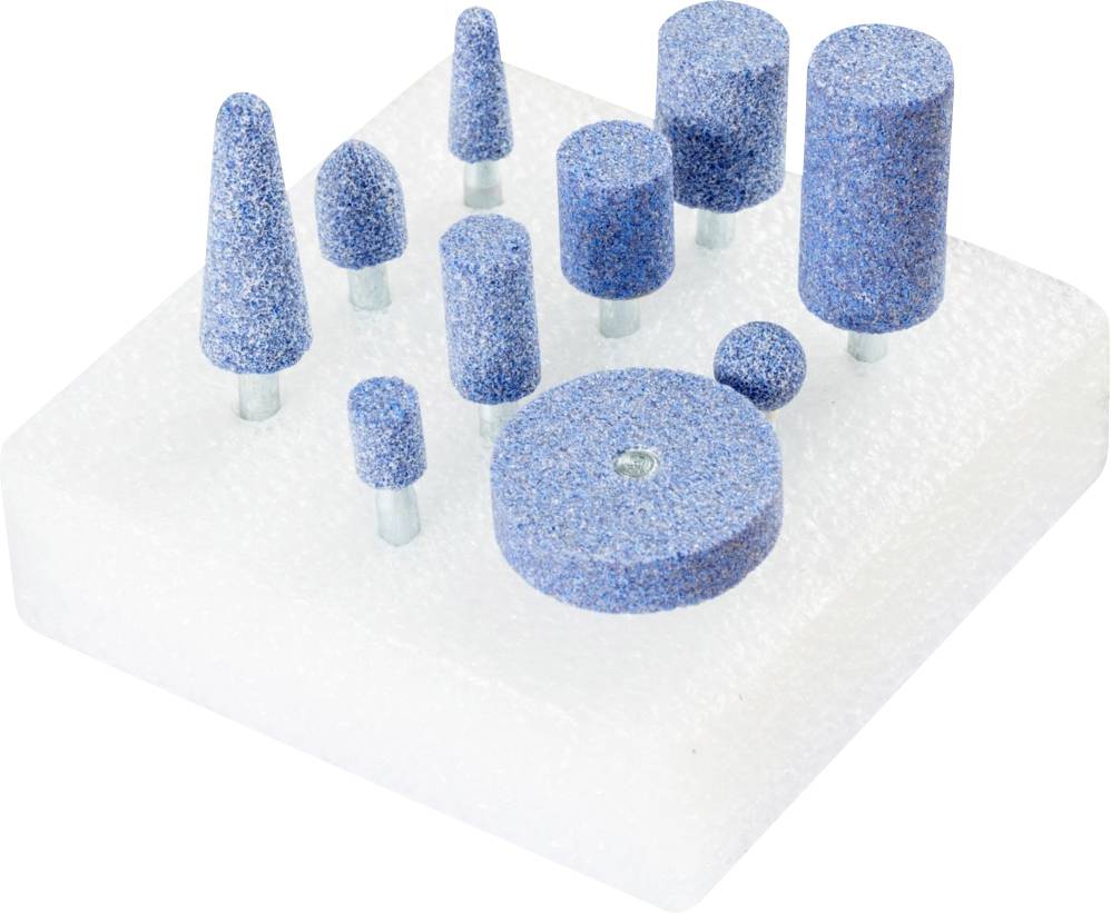 Une collection de meules bleues de différentes formes et tailles, disposées sur un bloc de mousse blanc.