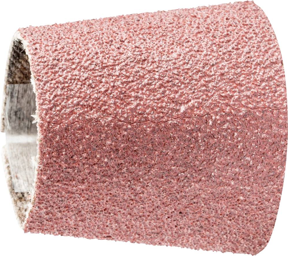 Un gros plan d'un ruban de ponçage rose. Il montre la texture rugueuse et la forme circulaire utilisée pour les travaux de ponçage.