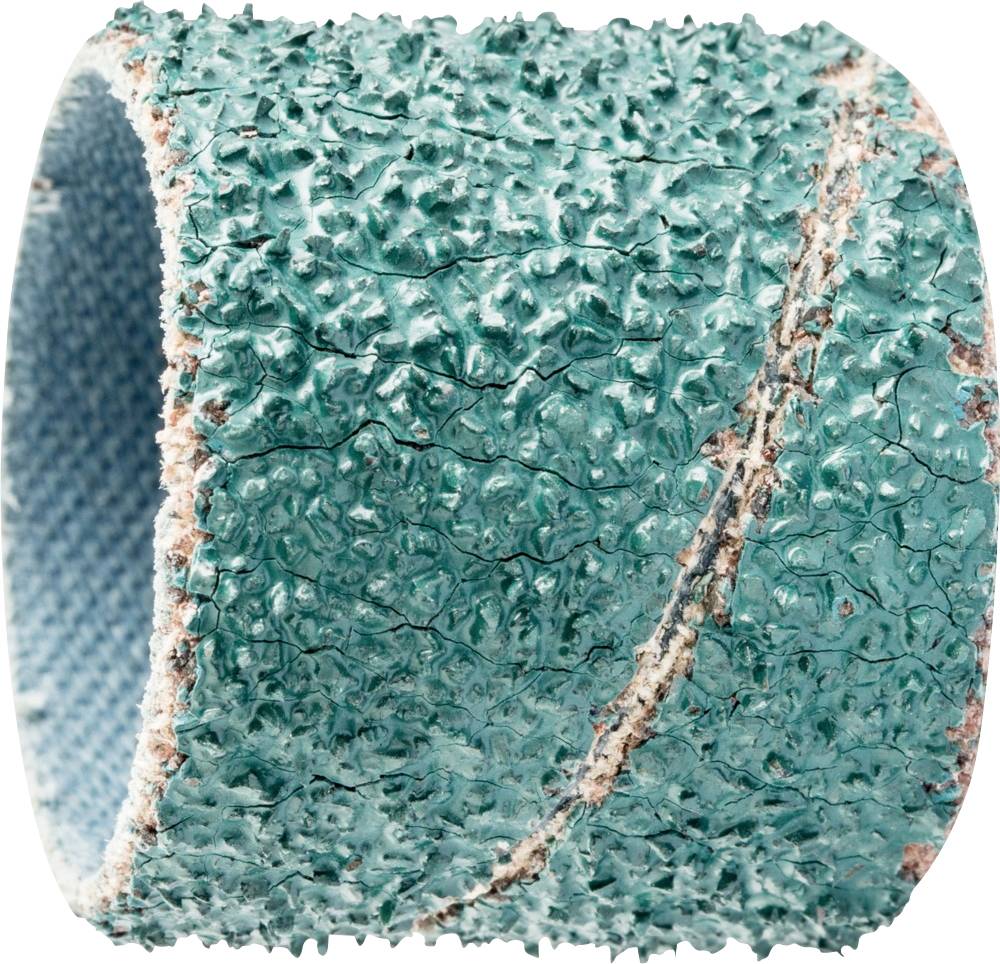 Un cylindre de meulage vert avec une surface rugueuse, structurée et résistante à l'abrasion. Utilisé pour le meulage et le polissage de matériaux.