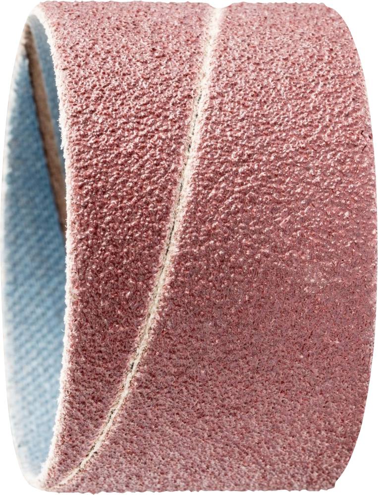 Un ruban de ponçage rouge, vu de côté, avec une texture rugueuse pour les travaux de ponçage, enroulé et prêt à l'emploi.