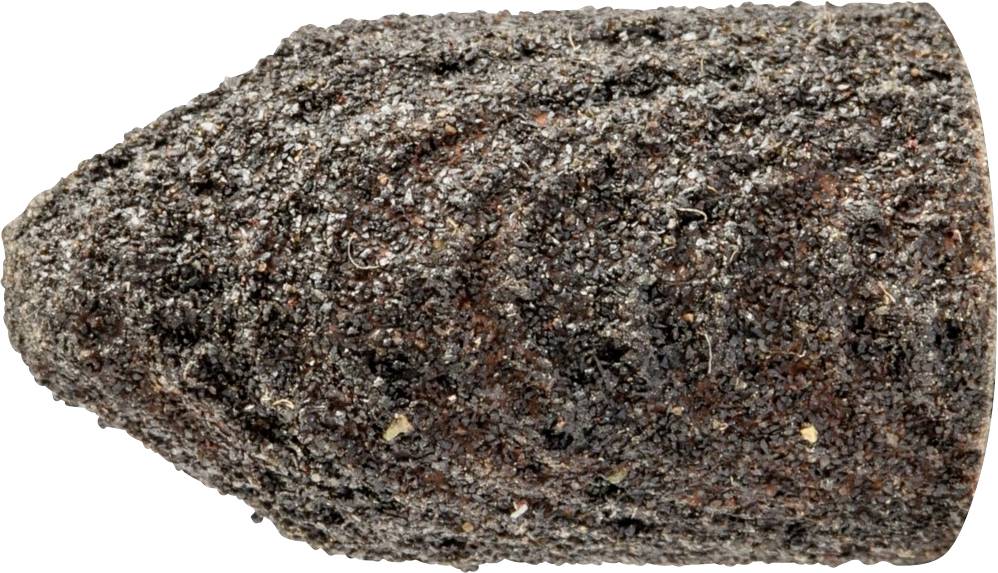 Gros plan d'un objet cylindrique érodé avec une surface rugueuse et sombre. Probablement un projectile ou un artefact antique.