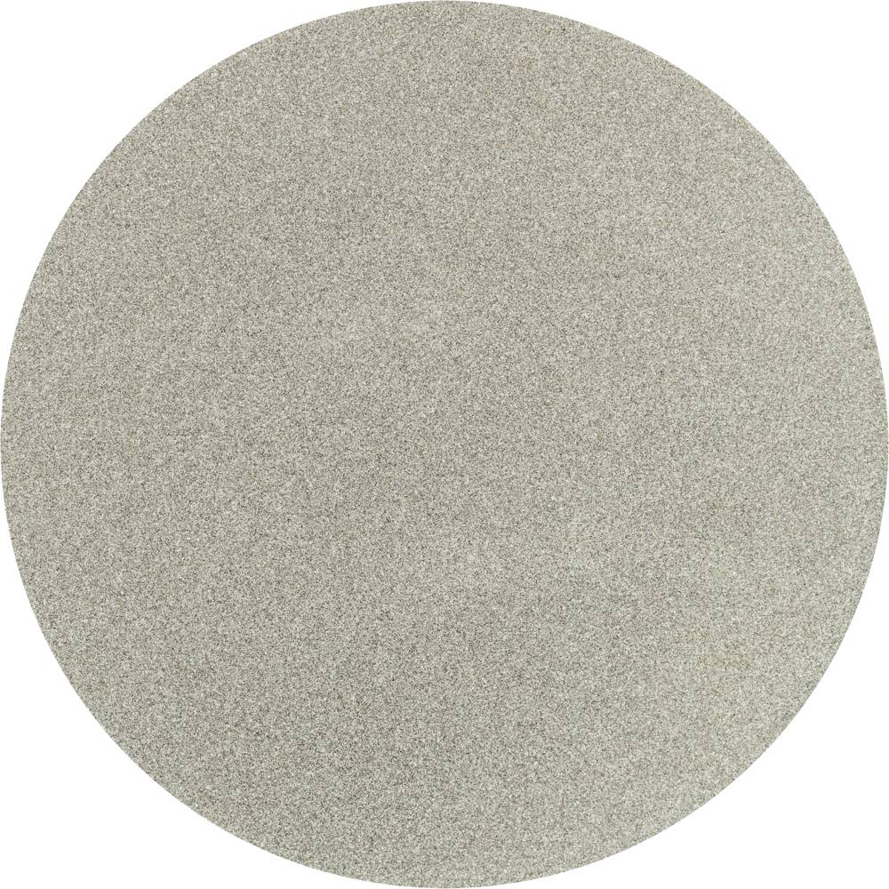 Un papier de verre rond, gris, posé à plat.