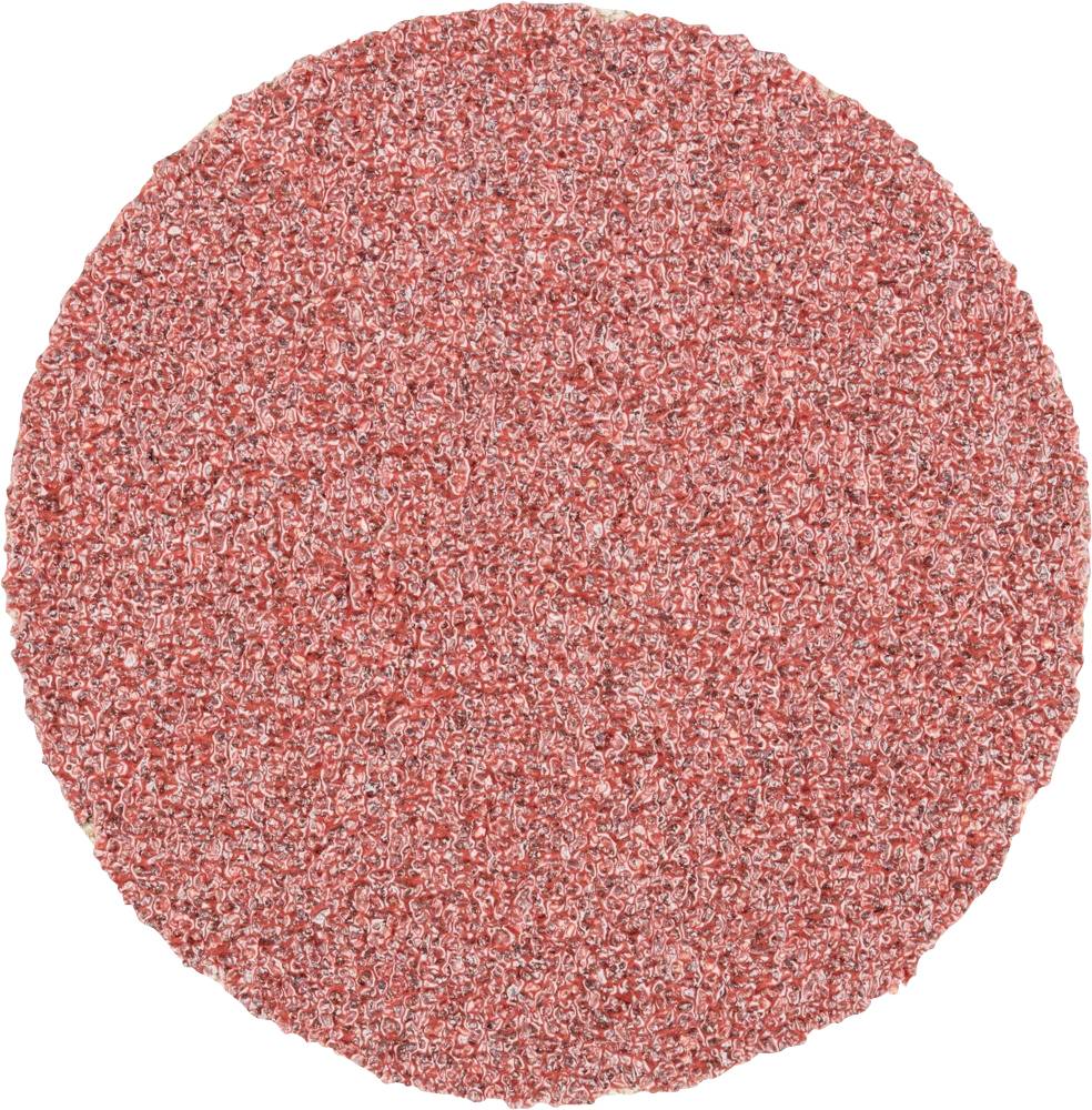 Tapis rond rose avec surface texturée, adapté à la décoration ou comme sous-couche chaude dans les espaces de vie.