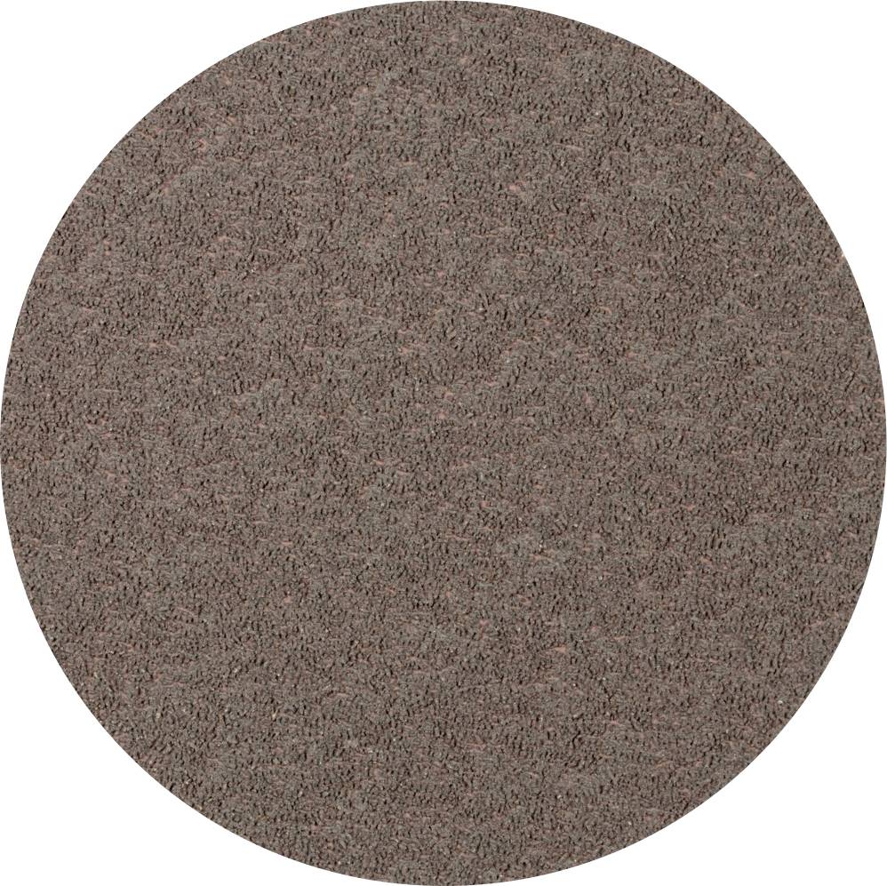Surface ronde de couleur brun foncé en matériau texturé.