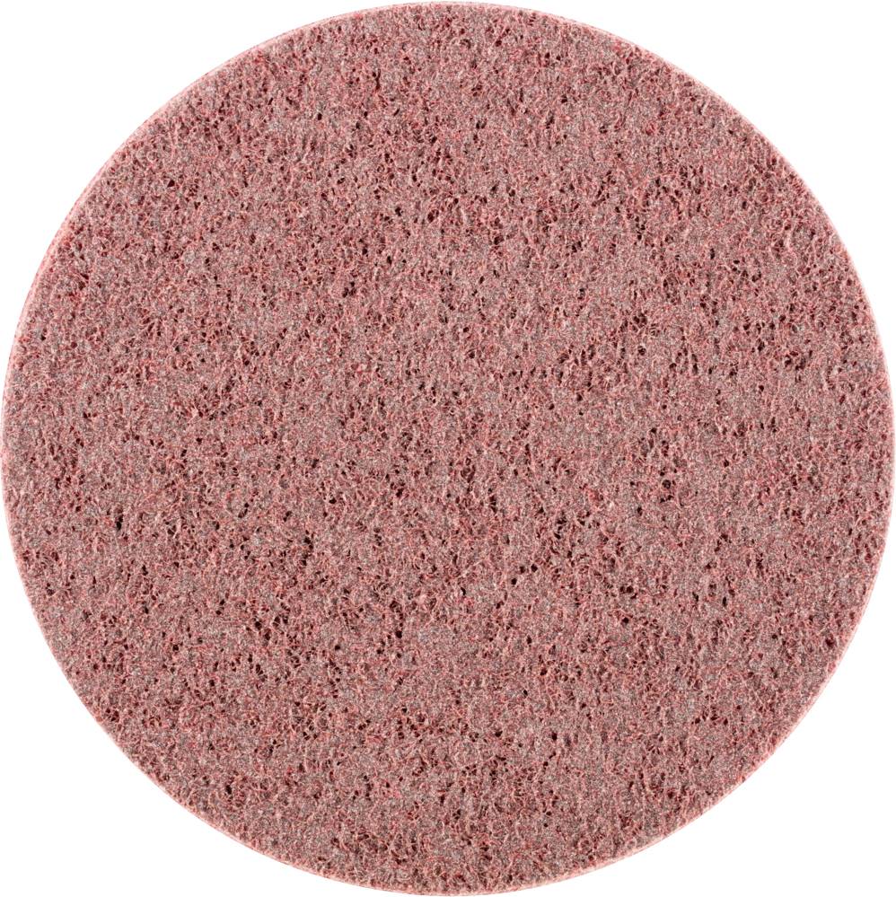 Un tampon de polissage rond et rouge à surface texturée.