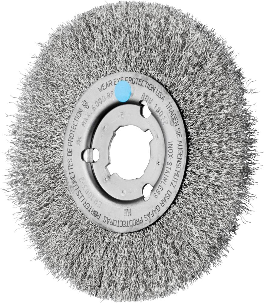 Brosse métallique à maille serrée avec ouverture centrale ; Avertissement : 'Porter une protection oculaire'. Utilisée pour le nettoyage de surface.