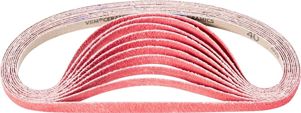 Des rubans de ponçage roses disposés en courbe, montrent la structure flexible et la diversité des applications dans l'artisanat.