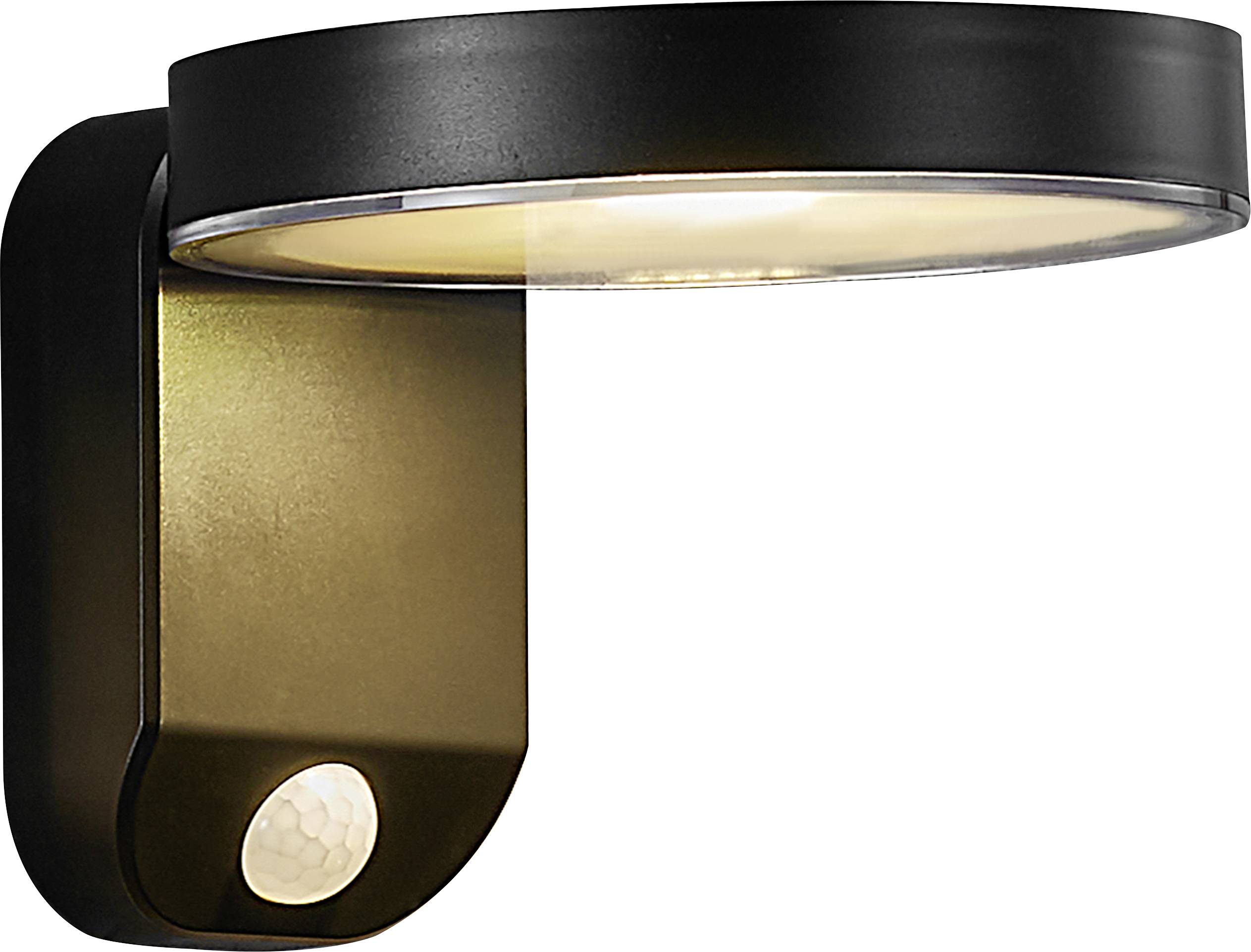 Lampe extérieure noire avec abat-jour rond et détecteur de mouvement montée sur le mur. Elle éclaire doucement vers le bas et assure l'éclairage extérieur.