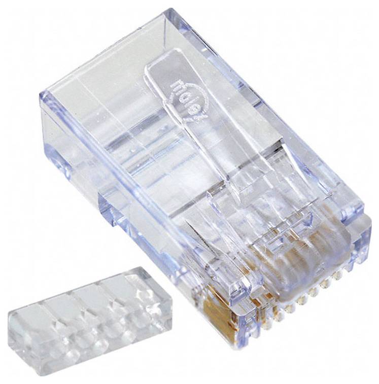 Connecteur Ethernet RJ45 montré en gros plan, mettant en évidence son boîtier en plastique transparent et ses contacts métalliques.