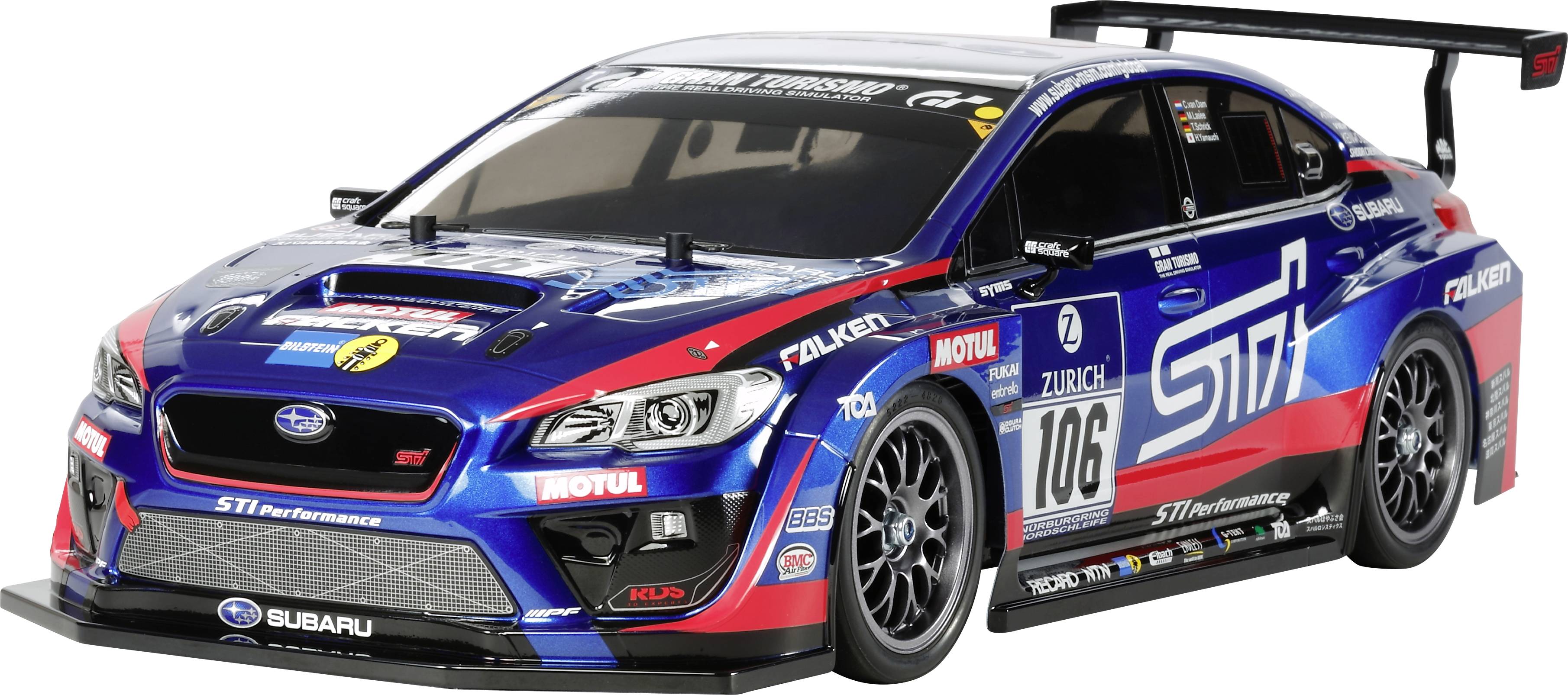 Une voiture de course bleue avec des logos Subaru et STI, ornée de logos de sponsors. Le numéro 106 est visible sur le côté.