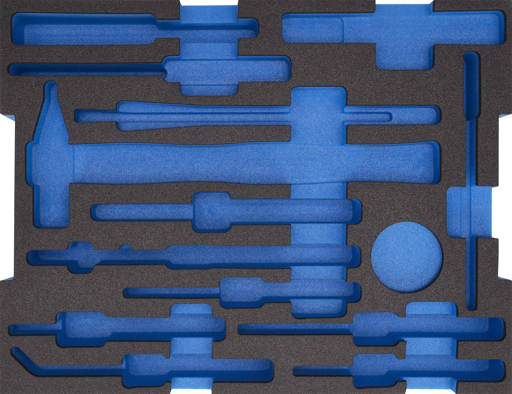 Boîte à outils avec cavités bleues ; contient différentes formes d'outils, notamment un marteau et un tournevis, dans une mousse noire.