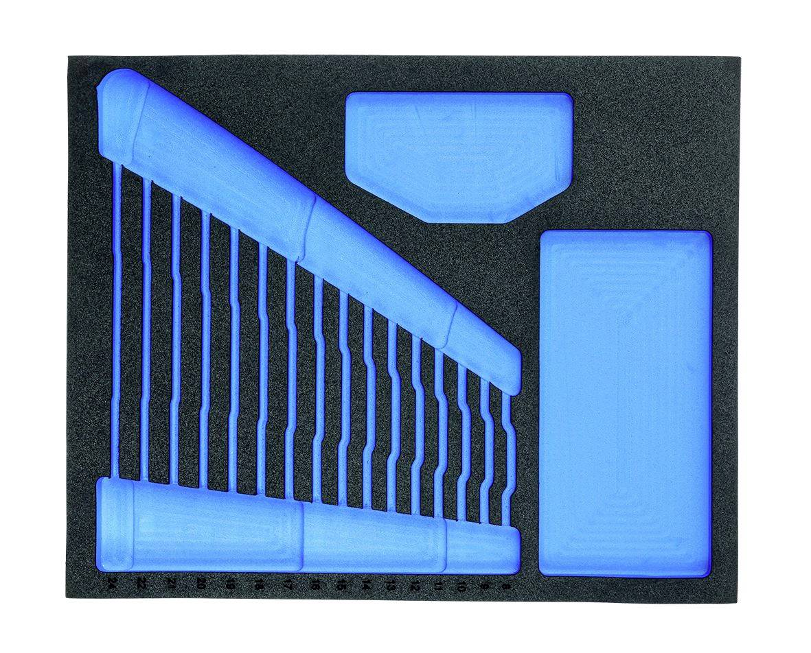 'Mousse de rangement avec supports d'outils bleus de différentes tailles, disposés en motif incliné, pour un stockage organisé.'