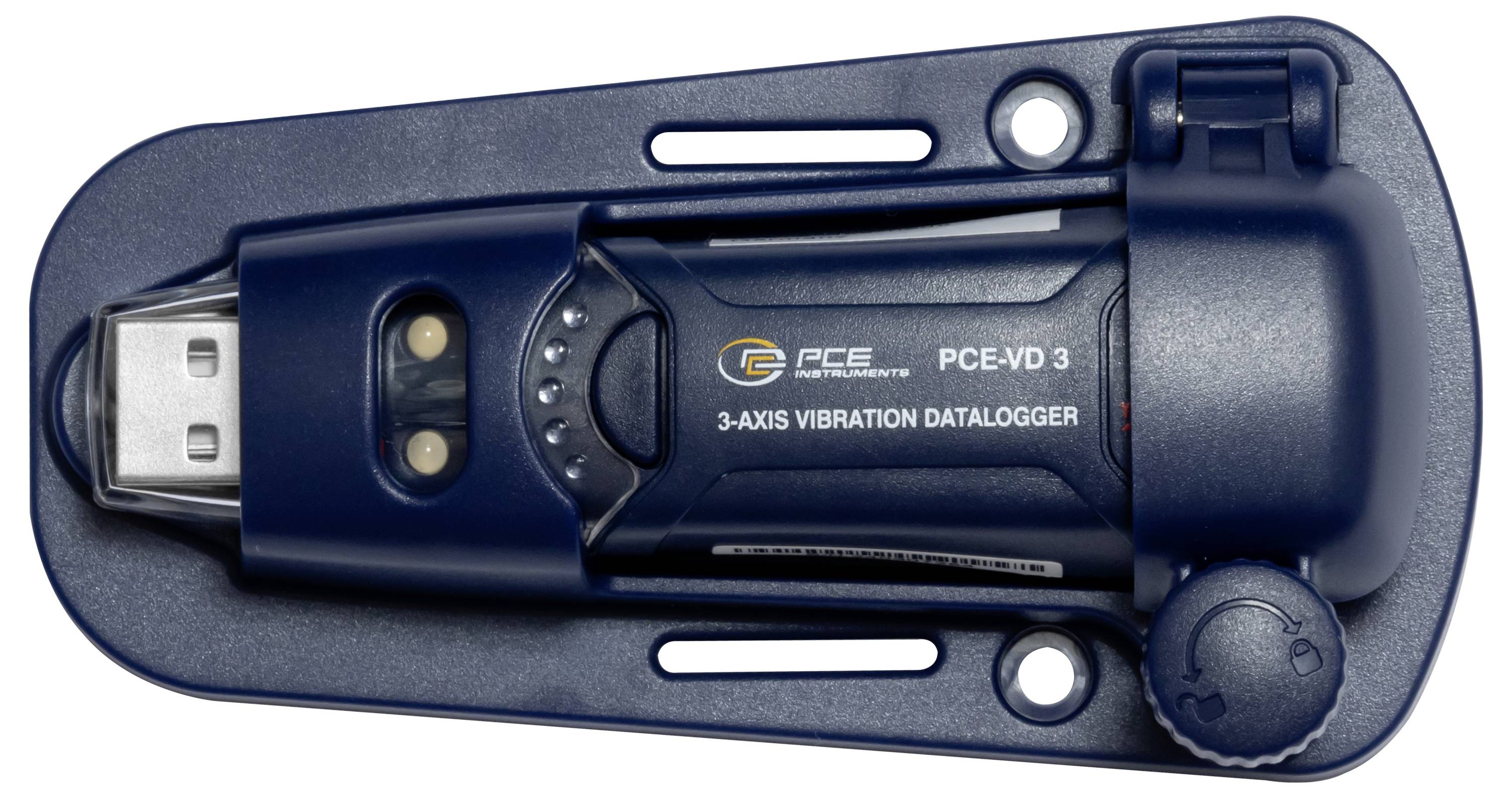Enregistreur de données de vibrations triaxial PCE-VD 3 portatif dans un étui de protection noir, avec connecteur USB et module capteur visible.