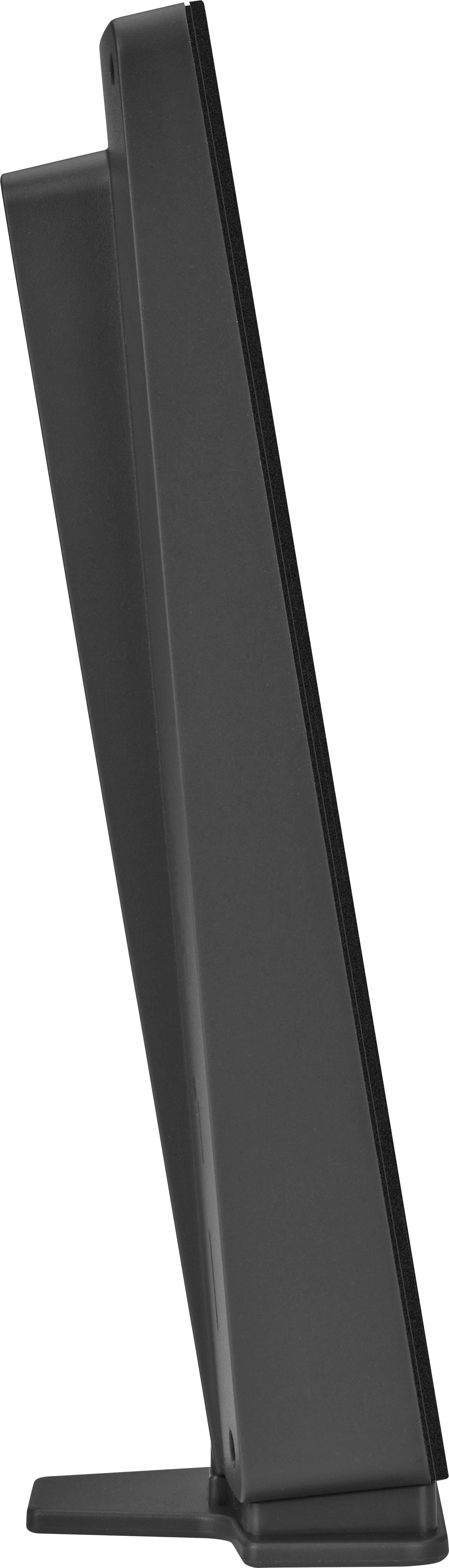 Un objet noir rectangulaire se tient verticalement, reposant sur sa base étroite, vu de profil.