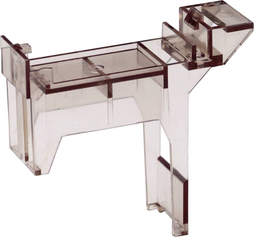 Un élément de construction transparent, plastique, dans une forme rectangulaire complexe avec plusieurs arêtes et sections.