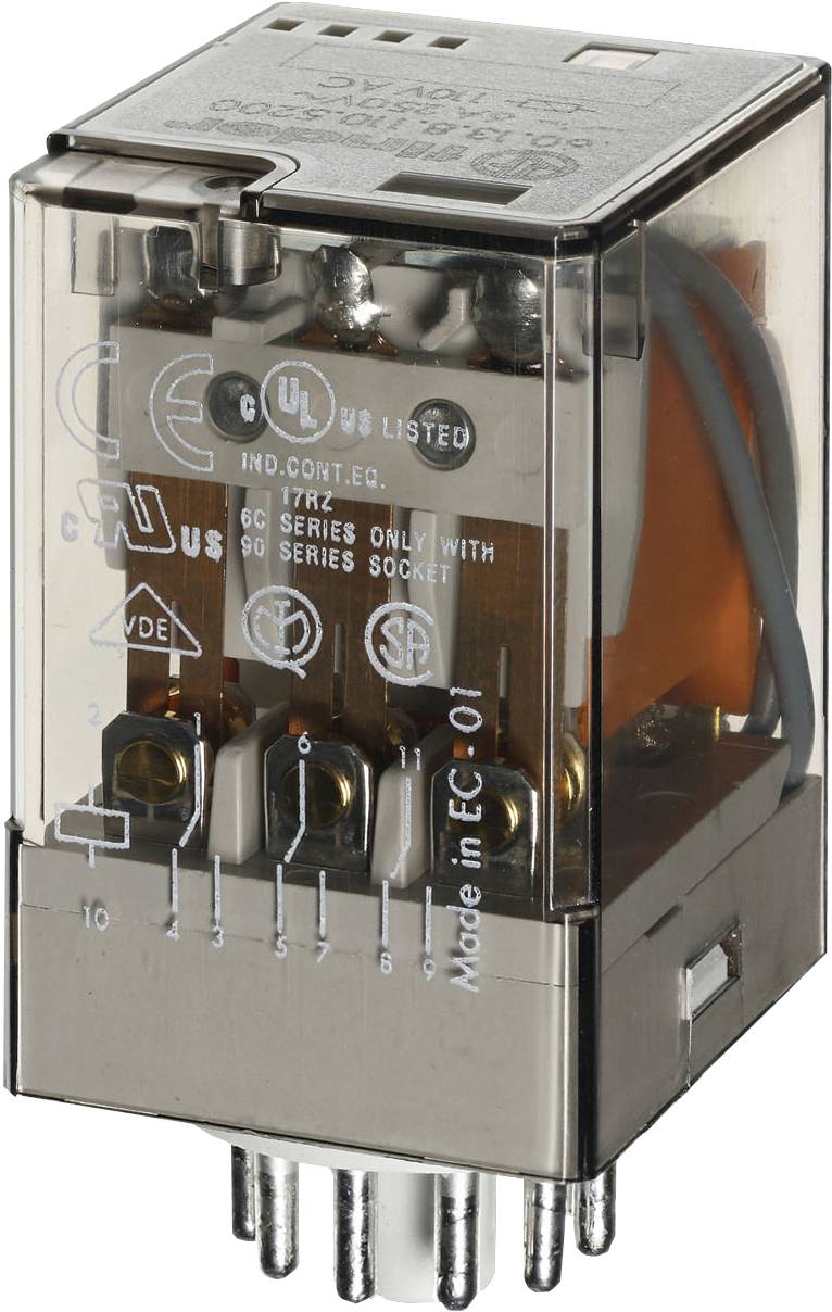 Un module électrique transparent avec des contacts métalliques et plusieurs symboles en surface, indiquant des certifications de sécurité.