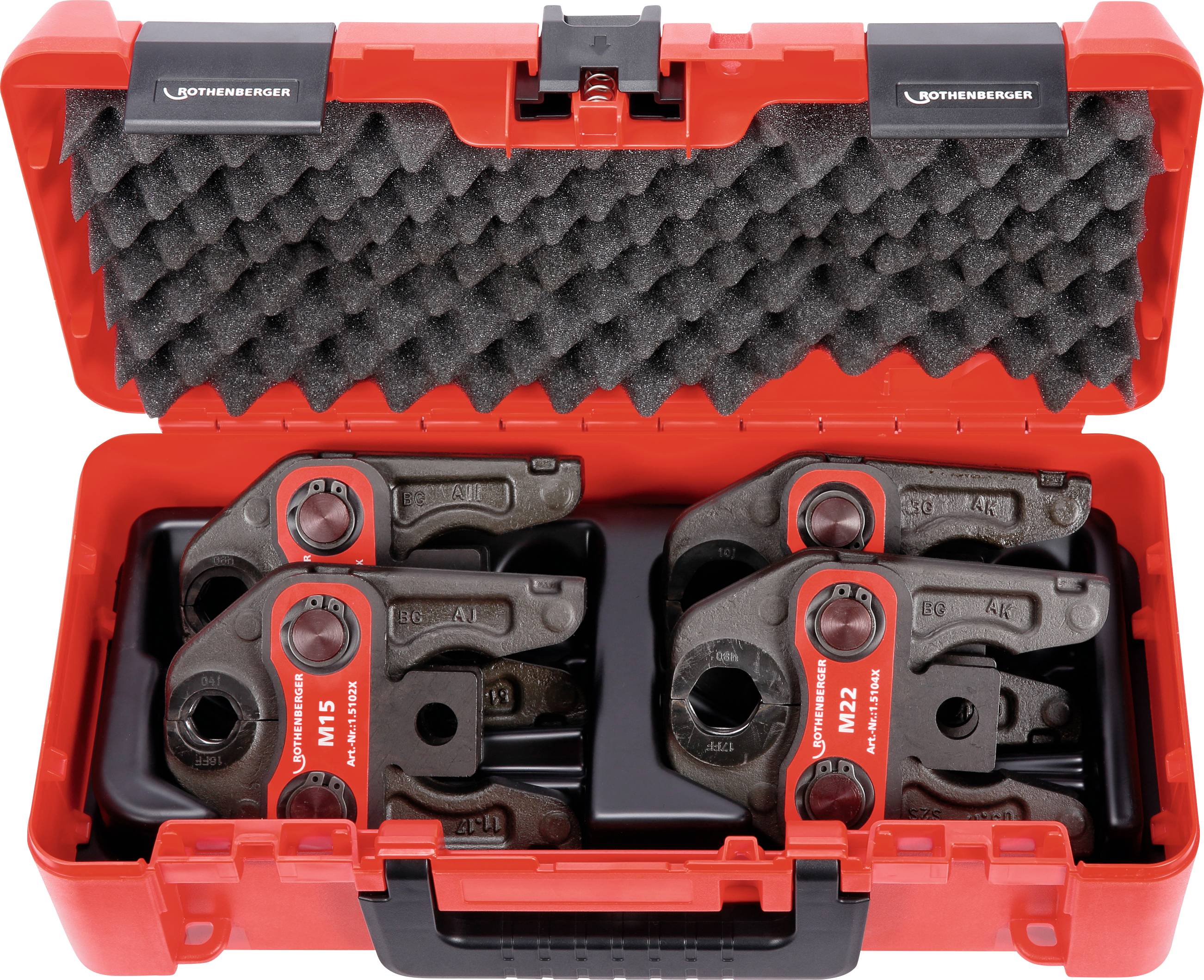 Boîte à outils rouge contenant des mâchoires de sertissage noires et rouges de différentes tailles. Ouverte, avec de la mousse grise à l'intérieur du couvercle.