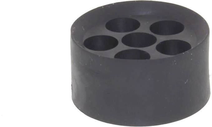 Bouchon en caoutchouc noir, rond, percé de six trous disposés en deux rangées.