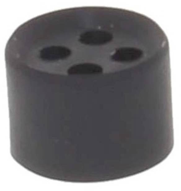 Un objet noir, rond, cylindrique avec quatre trous sur le dessus.