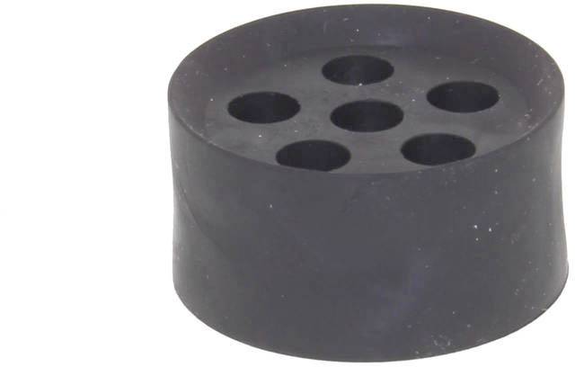 Bouchon en caoutchouc noir rond, percé de six trous disposés en deux rangées.