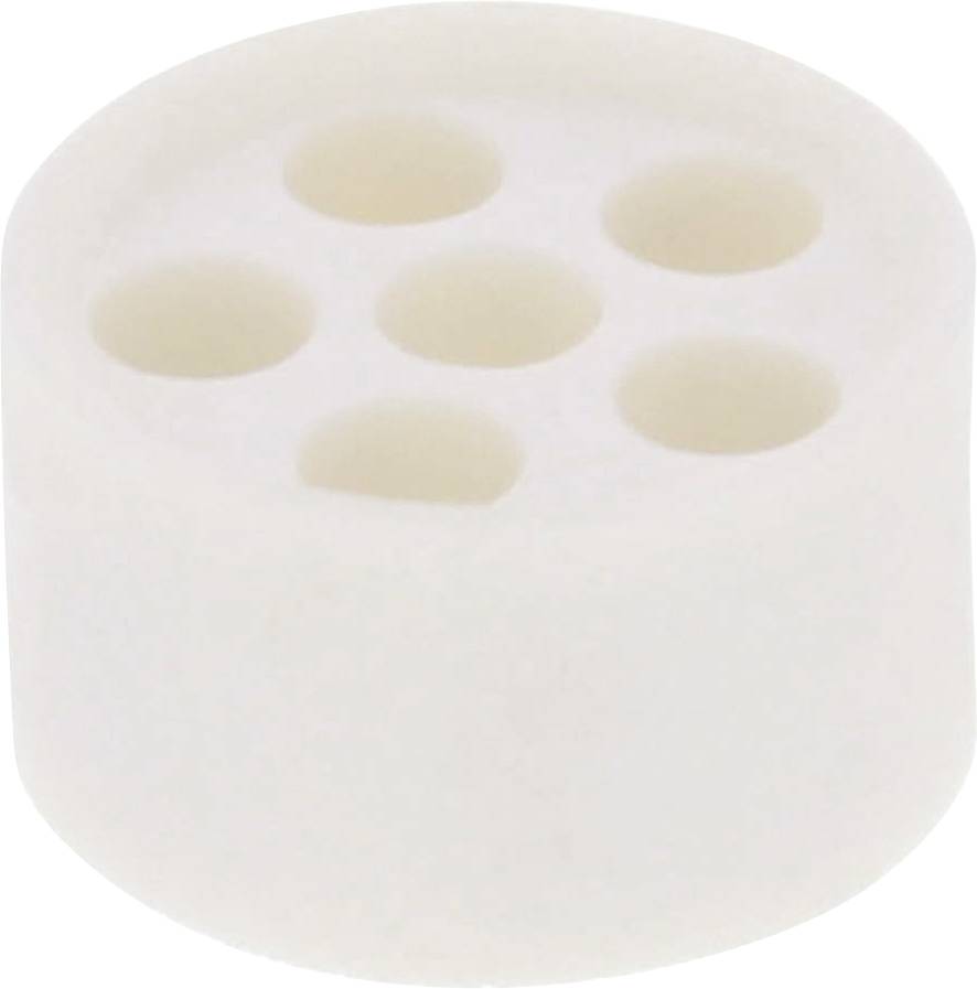 Pièce en céramique avec six cavités circulaires sur sa surface supérieure.