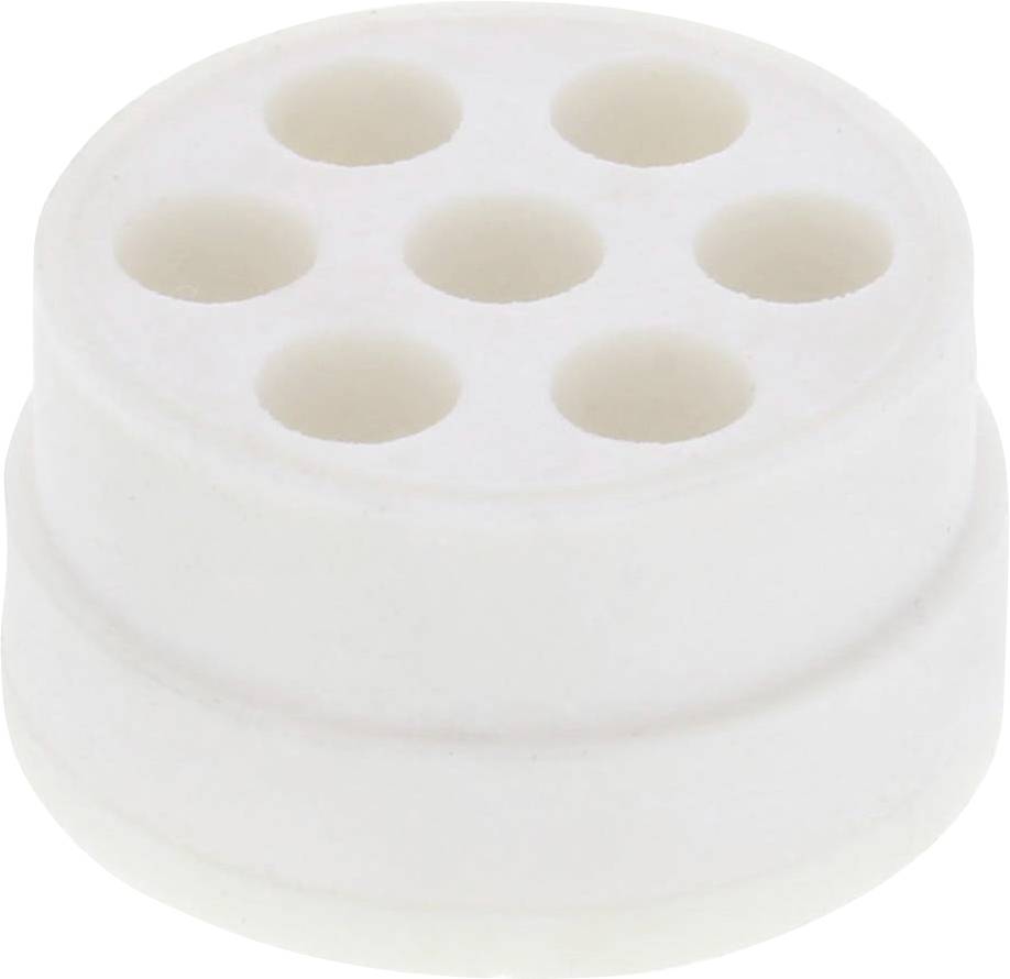 Un objet blanc, cylindrique, avec six cavités circulaires sur sa surface supérieure.