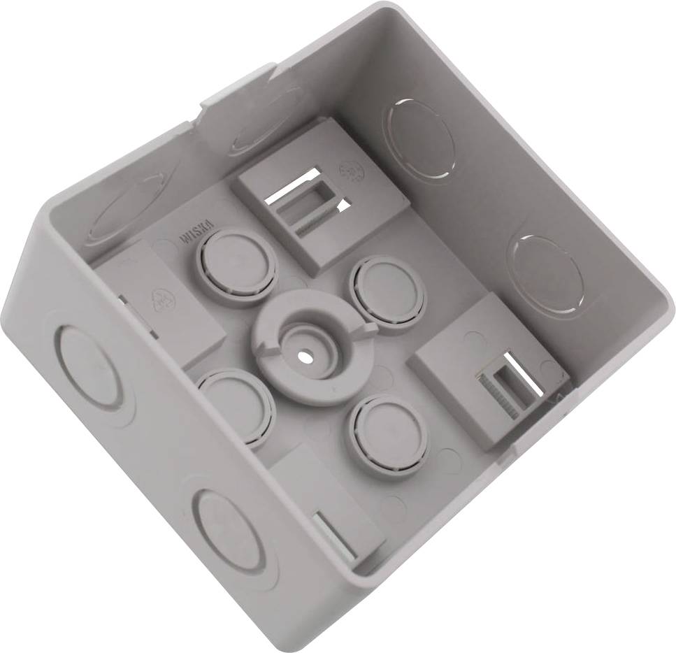 Boîte de dérivation grise encastrable avec plusieurs entrées de câbles et points de fixation pour le montage d'installations électriques.