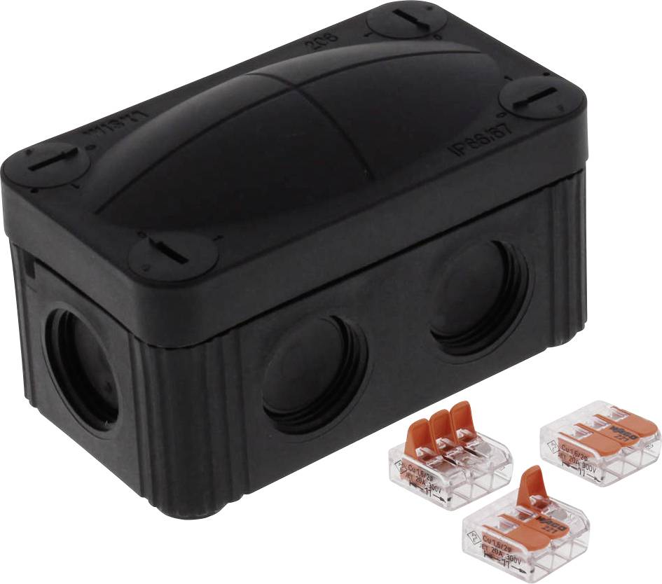Boîte de connexion noire avec des entrées de câbles ouvertes et trois connecteurs transparents à côté. Adaptée pour les installations électriques.